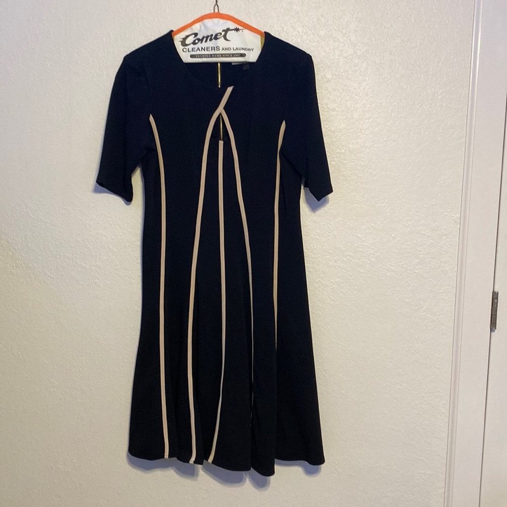 Black with ivory stripes Danny and Nicole brand dress. Good condition.